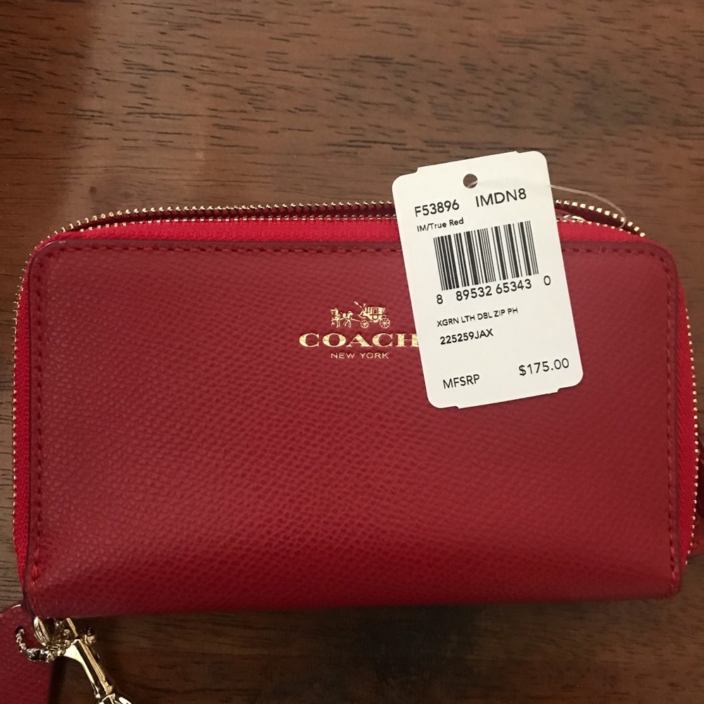 Coach wristlet color red.  NWT
